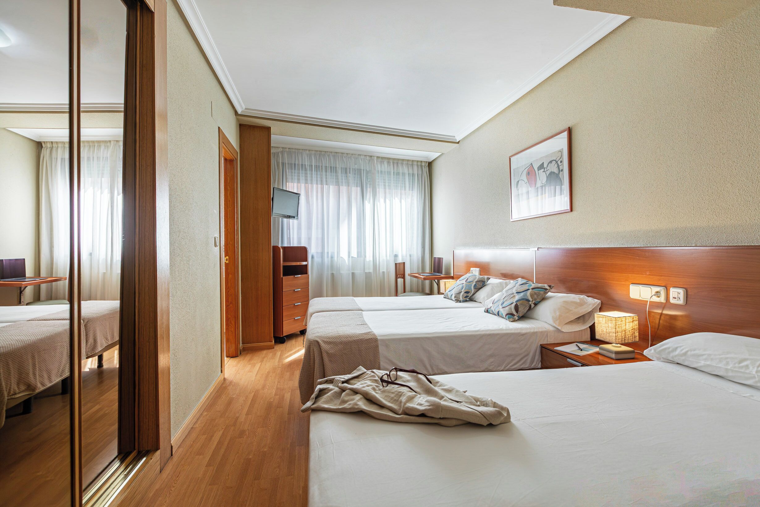 Triple Room | Desk, blackout curtains, free cots/infant beds, free WiFi