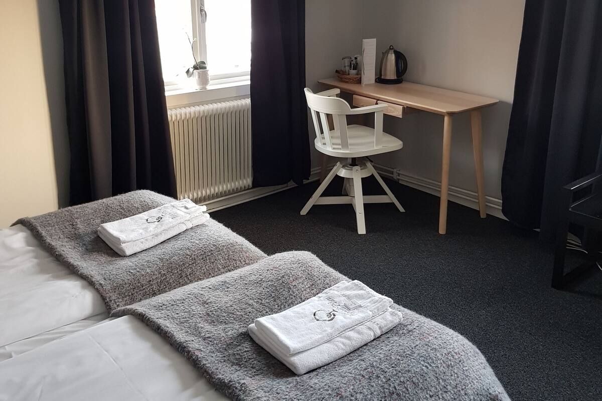 Desk, iron/ironing board, free WiFi, bed sheets