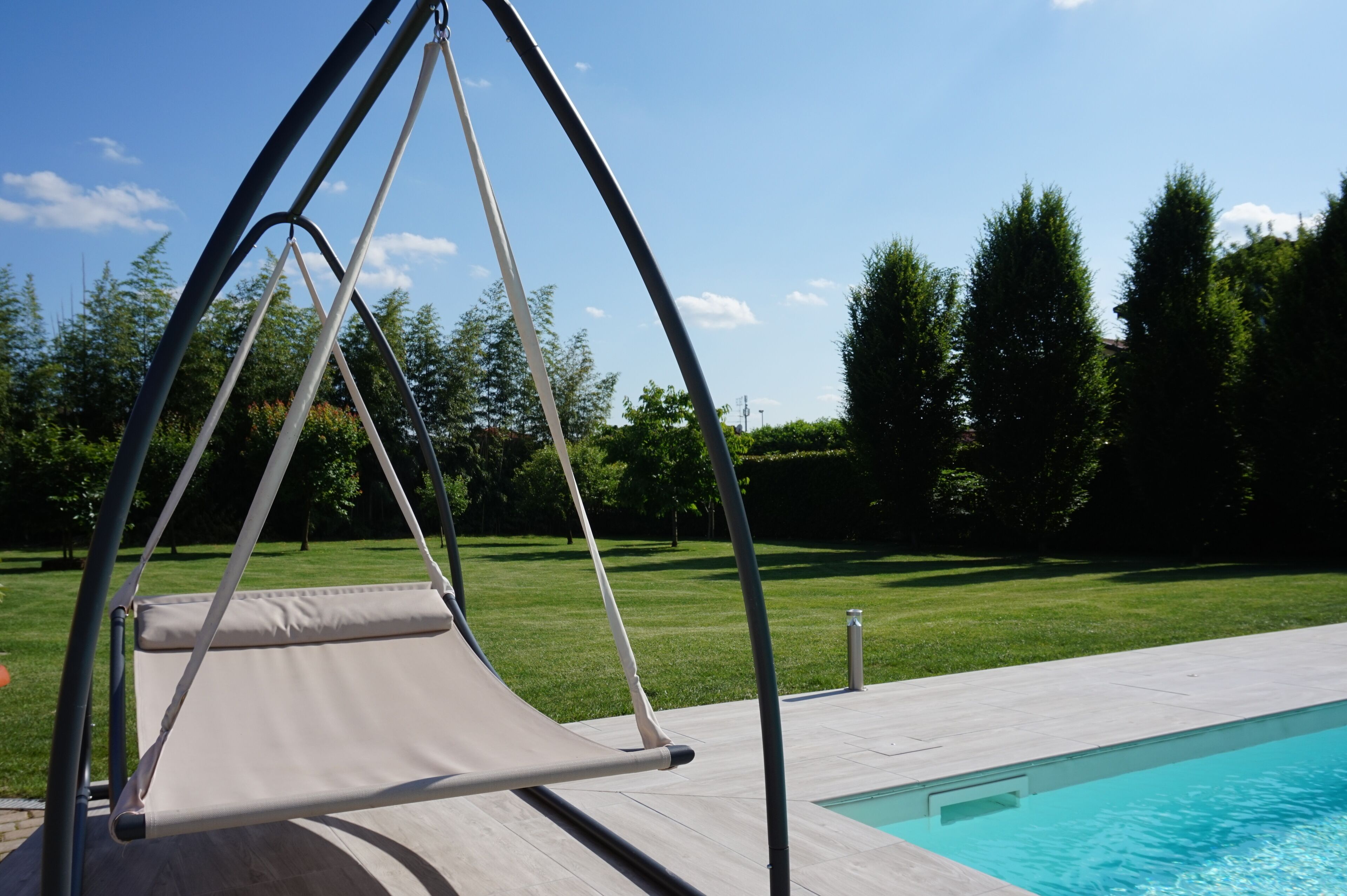 Seasonal outdoor pool, pool umbrellas, pool loungers