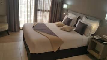 Premium bedding, free minibar items, in-room safe, desk