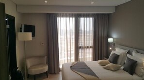 Premium bedding, free minibar items, in-room safe, desk