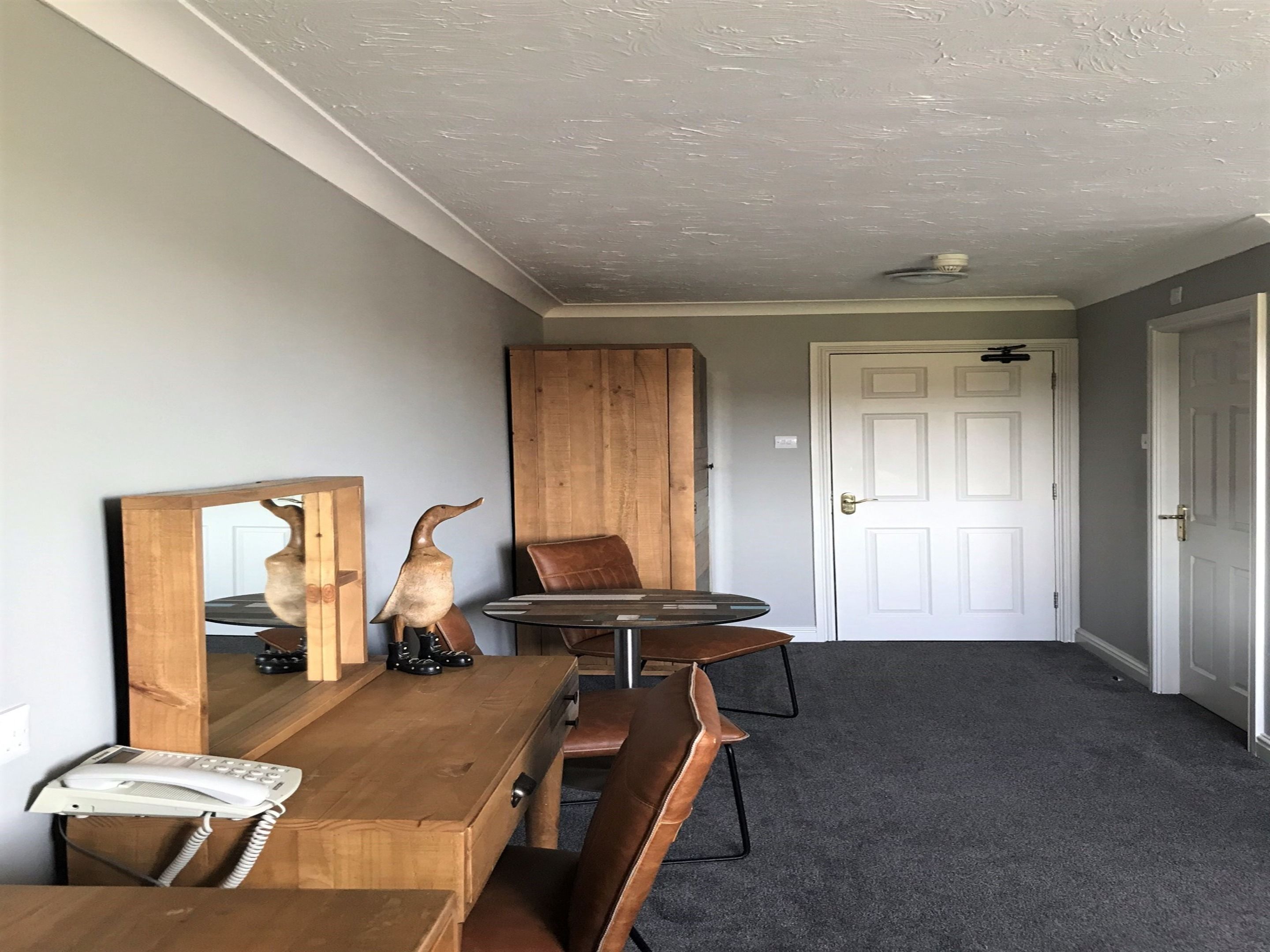 family room | 1 bedroom, premium bedding, desk, iron/ironing board