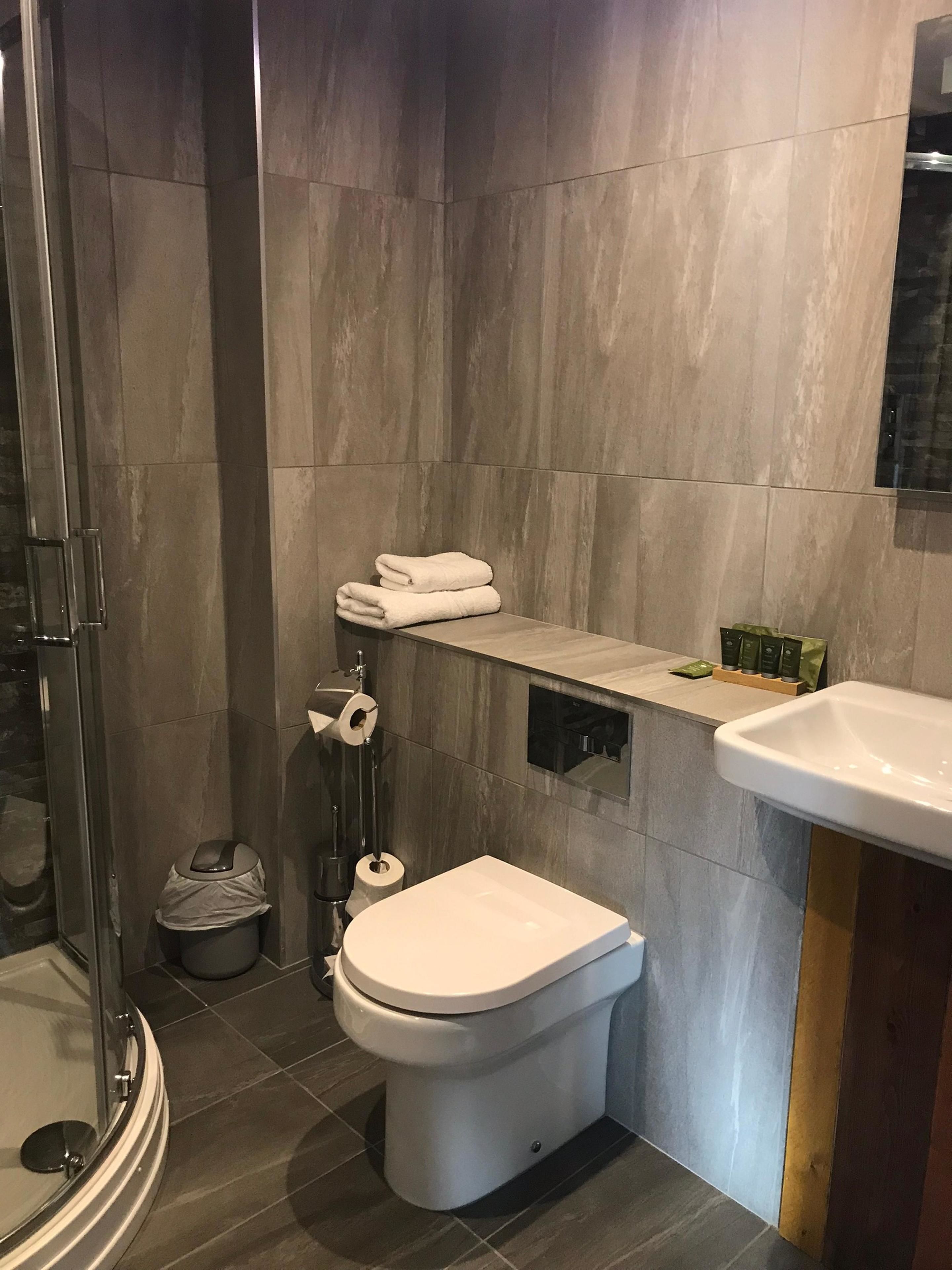 deep-soaking bathtub, free toiletries, hair dryer, towels