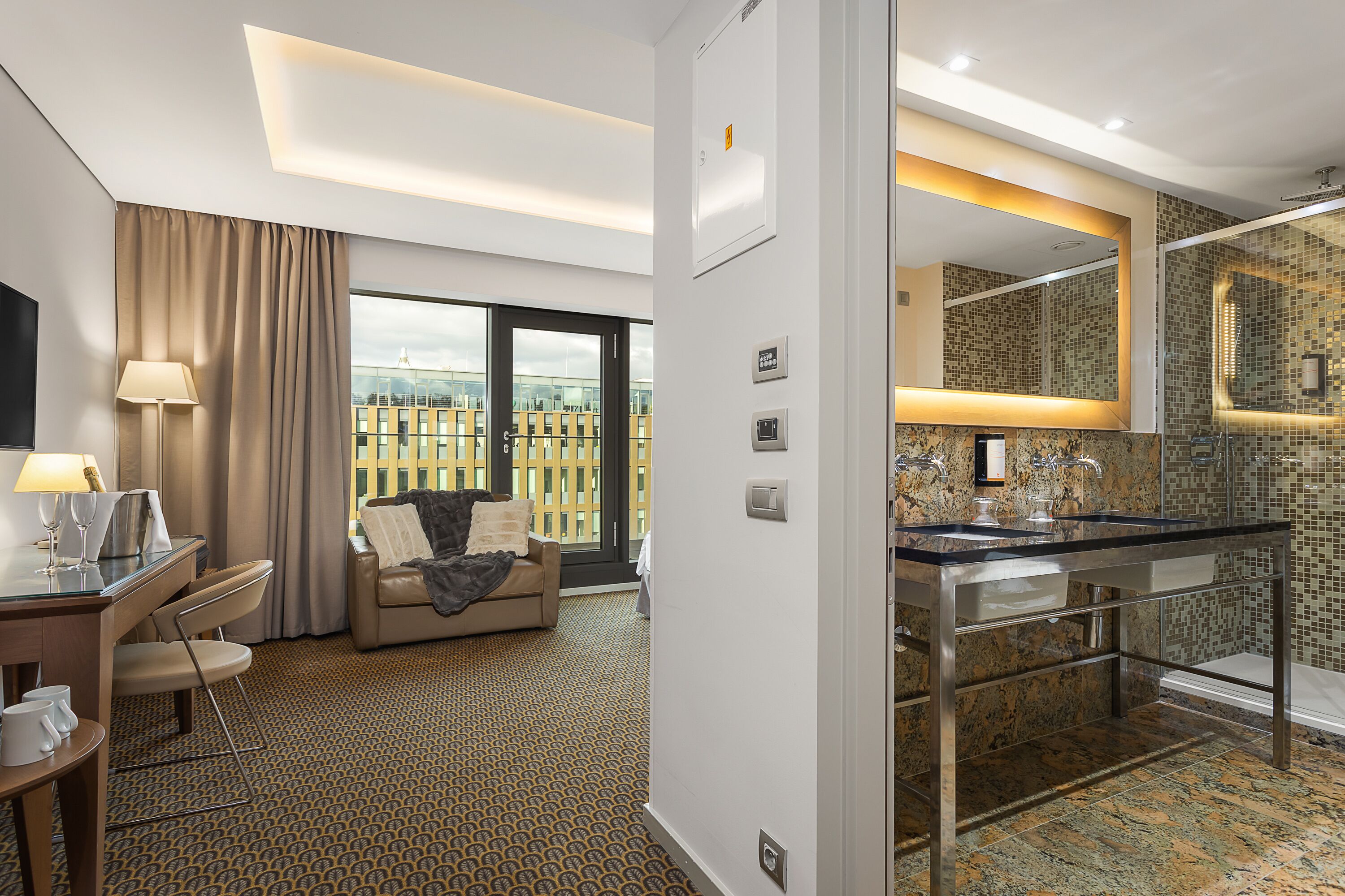 designer toiletries, hair dryer, towels, soap