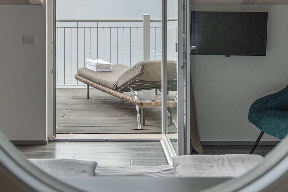 superior double room, jetted tub, lake view | 1 bedroom, in-room safe, desk, blackout curtains