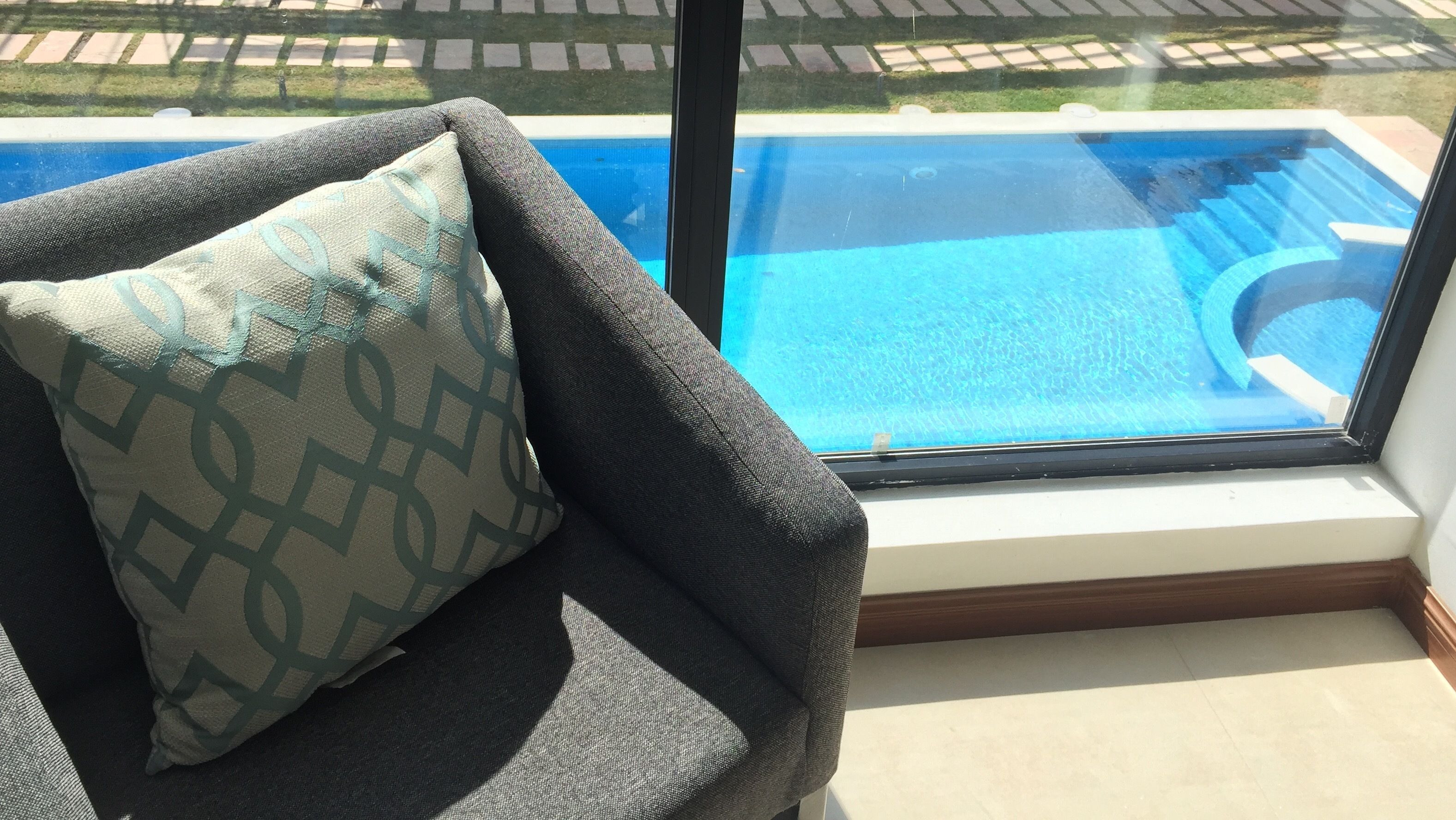 Outdoor pool, open 9:00 AM to 8:00 PM, pool loungers