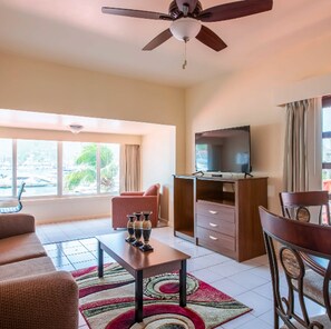 Executive Suite, 1 King Bed, Sea Facing | Living area | Flat-screen TV - Village Cay Hotel and Marina (Road Town)