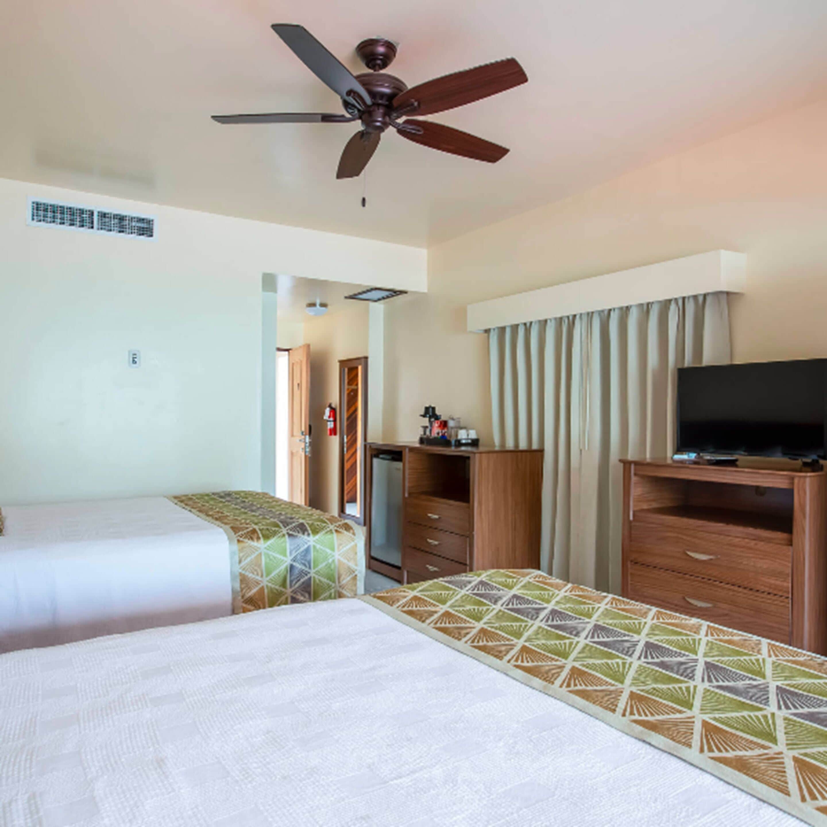 superior room, 2 queen beds, sea facing | 1 bedroom, in-room safe, individually decorated, individually furnished