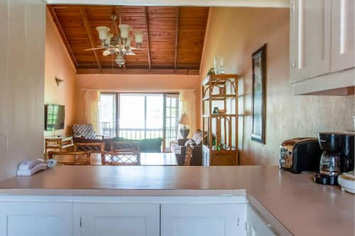 Apartamento superior, 2 habitaciones, vistas al jardín | Cocina privada | Frigorífico pequeño y cafetera o tetera