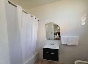 Family Apartment, Balcony, Poolside | Bathroom | Free toiletries, hair dryer - West Coast Inn's (Cabo Rojo)