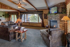 Premier Penthouse, 3 Bedrooms, Lake View | Living room | Flat-screen TV, fireplace