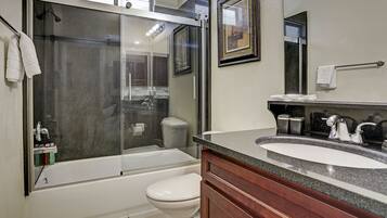 Combined shower/bathtub, deep-soaking bathtub, rainfall showerhead