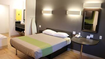 Desk, laptop workspace, blackout curtains, iron/ironing board