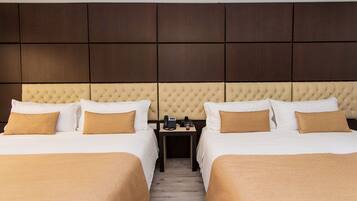 Ropa de cama de alta calidad y minibar