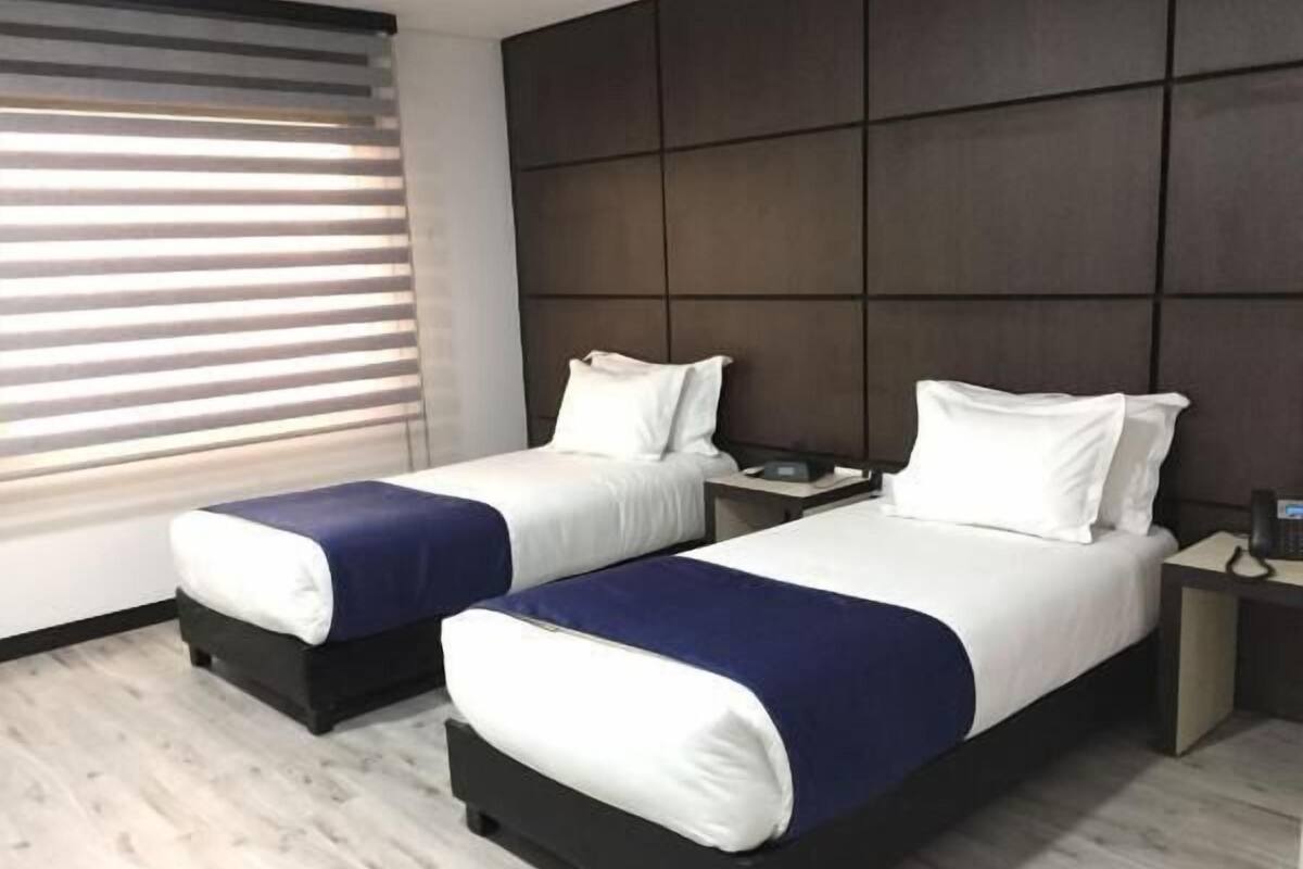 Luxe beddengoed, een minibar, een kluis op de kamer, een bureau