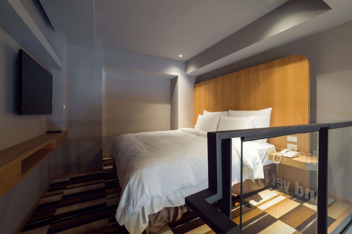 Down comforters, desk, blackout drapes, soundproofing