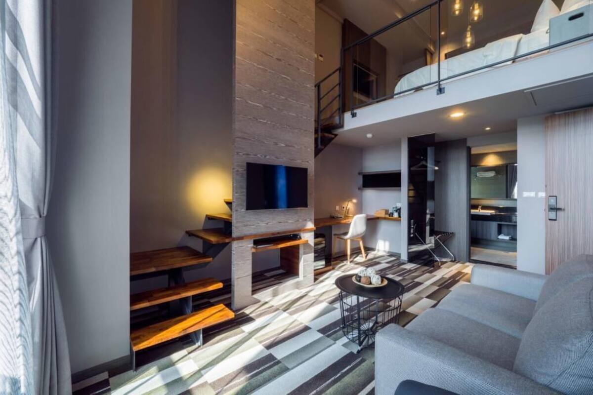 Down comforters, desk, blackout drapes, soundproofing