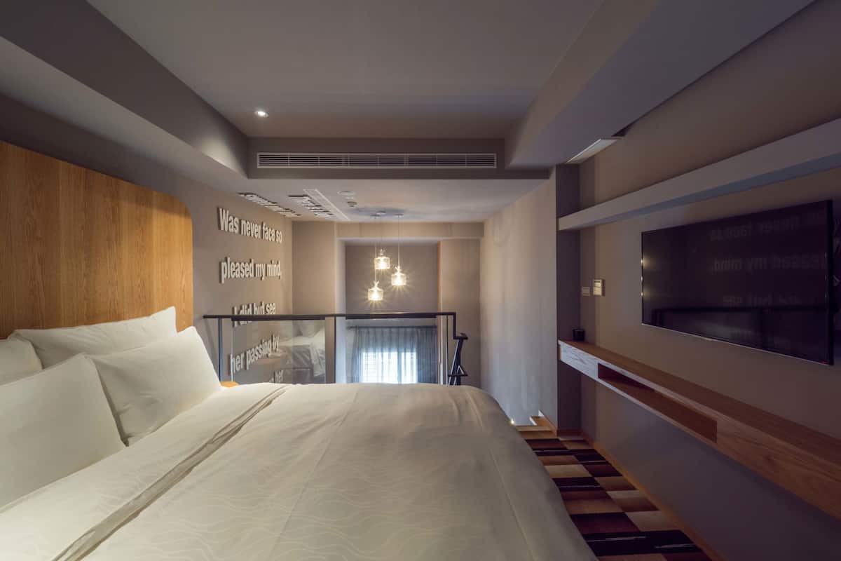 Down comforters, desk, blackout drapes, soundproofing