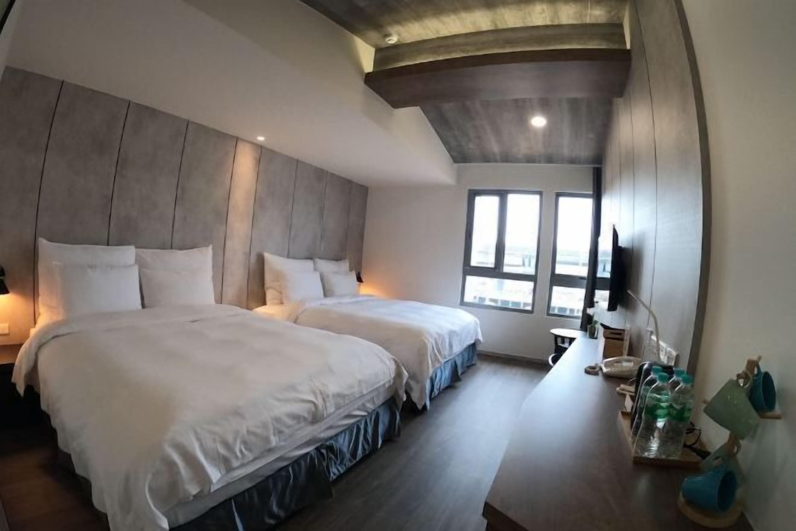 Down comforters, desk, blackout drapes, soundproofing