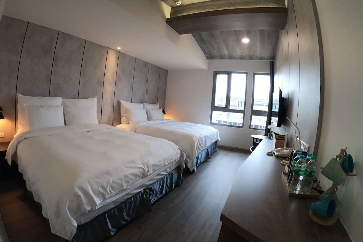 Down comforters, desk, blackout drapes, soundproofing