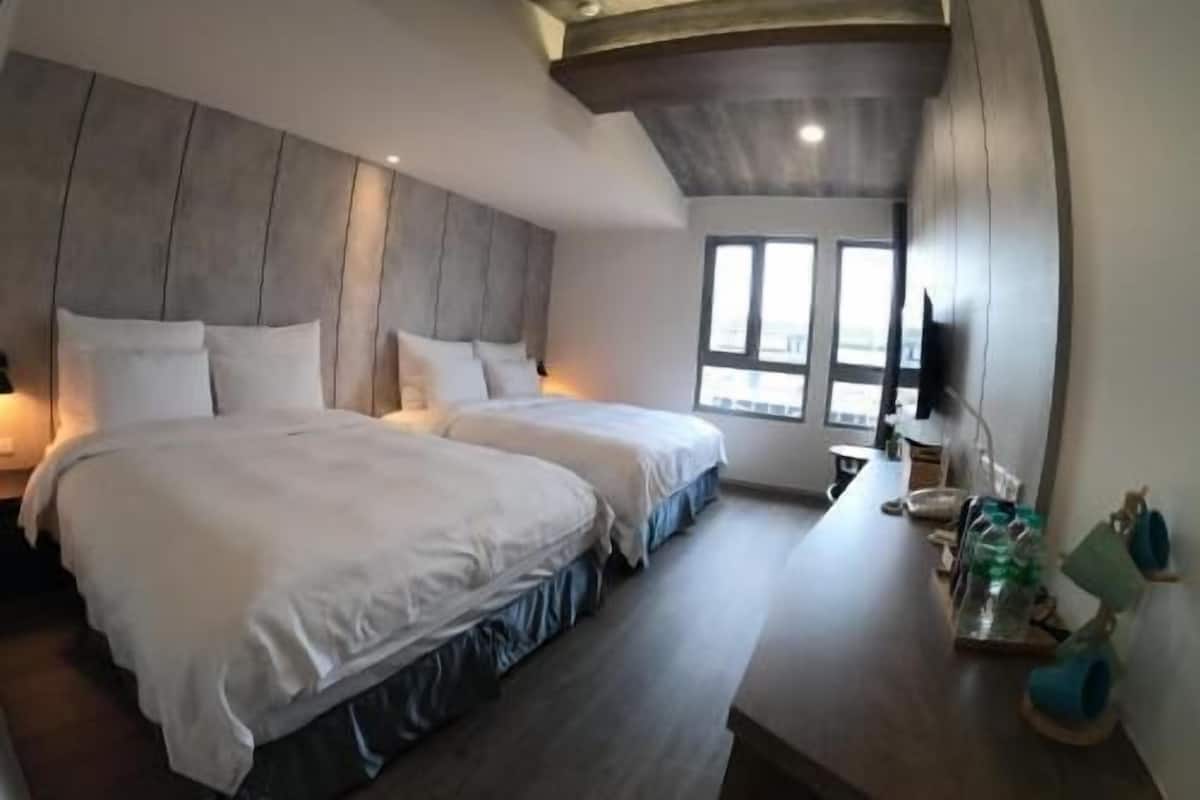 Down comforters, desk, blackout drapes, soundproofing