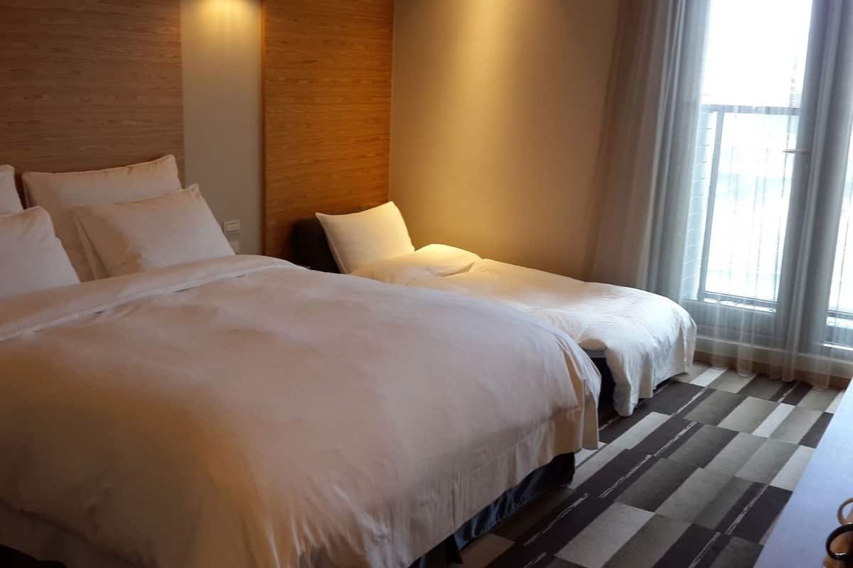 Down comforters, desk, blackout drapes, soundproofing