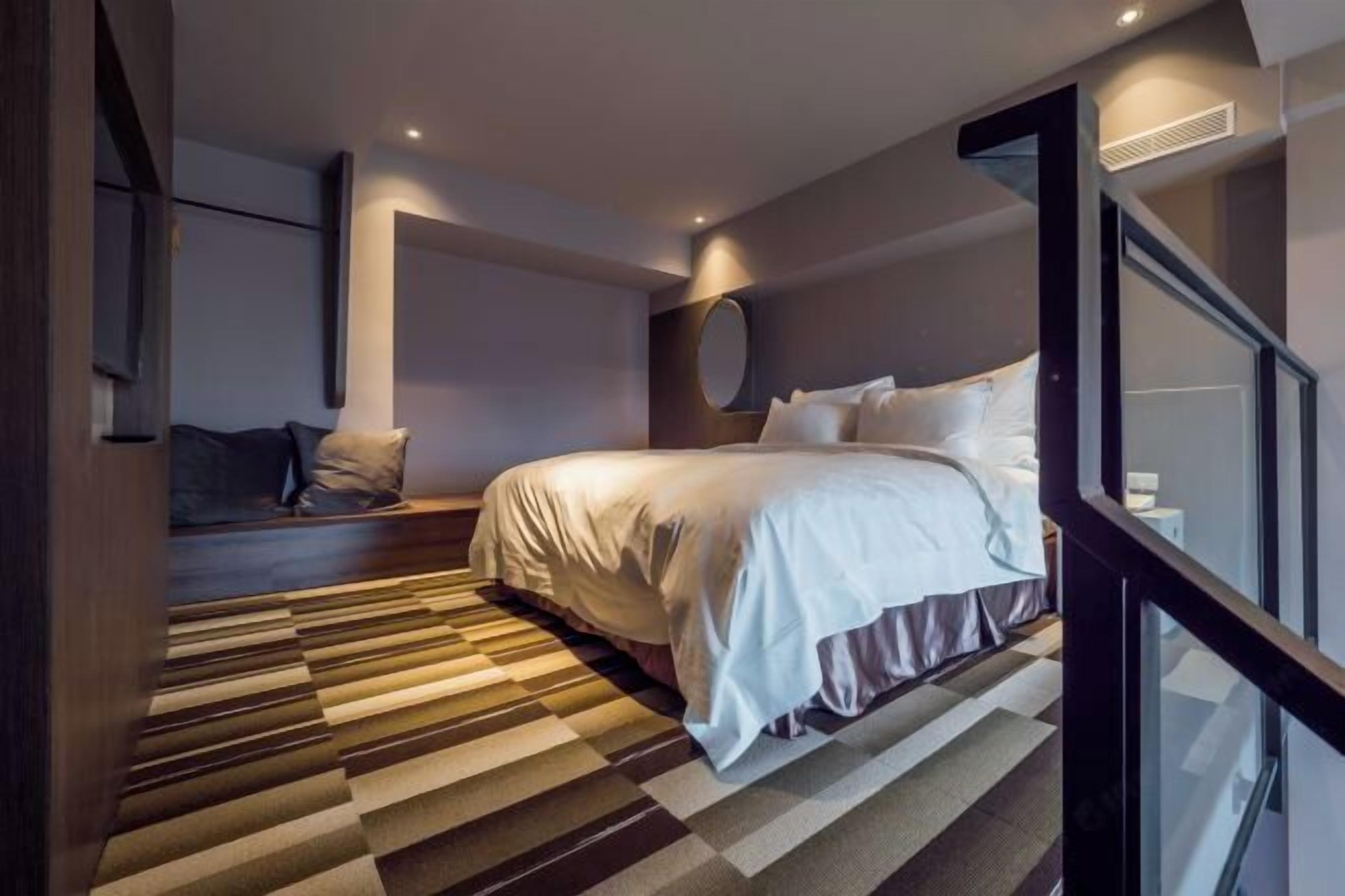 Down comforters, desk, blackout drapes, soundproofing