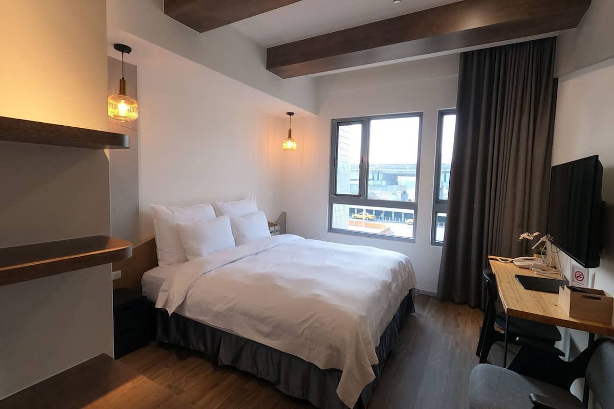 Down comforters, desk, blackout drapes, soundproofing