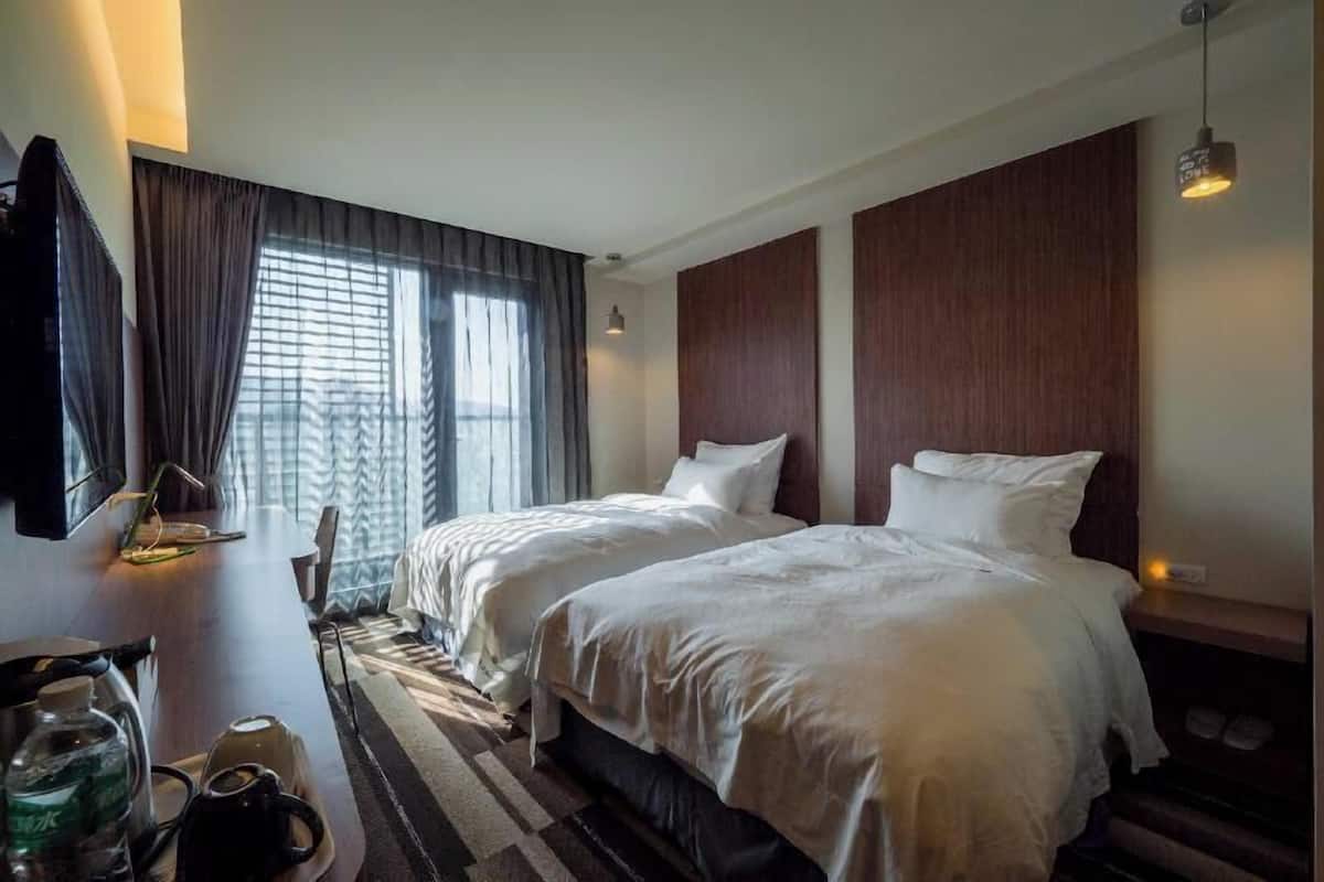 Down comforters, desk, blackout drapes, soundproofing