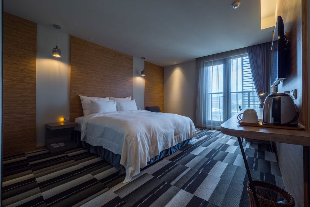 Down comforters, desk, blackout drapes, soundproofing