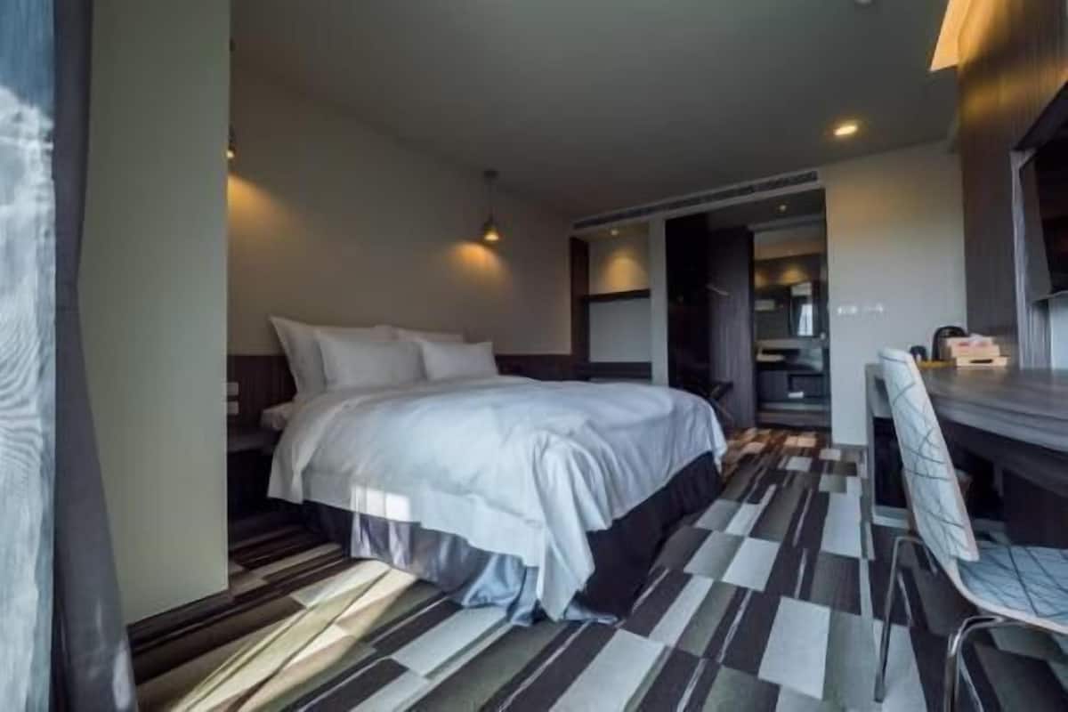 Down comforters, desk, blackout drapes, soundproofing