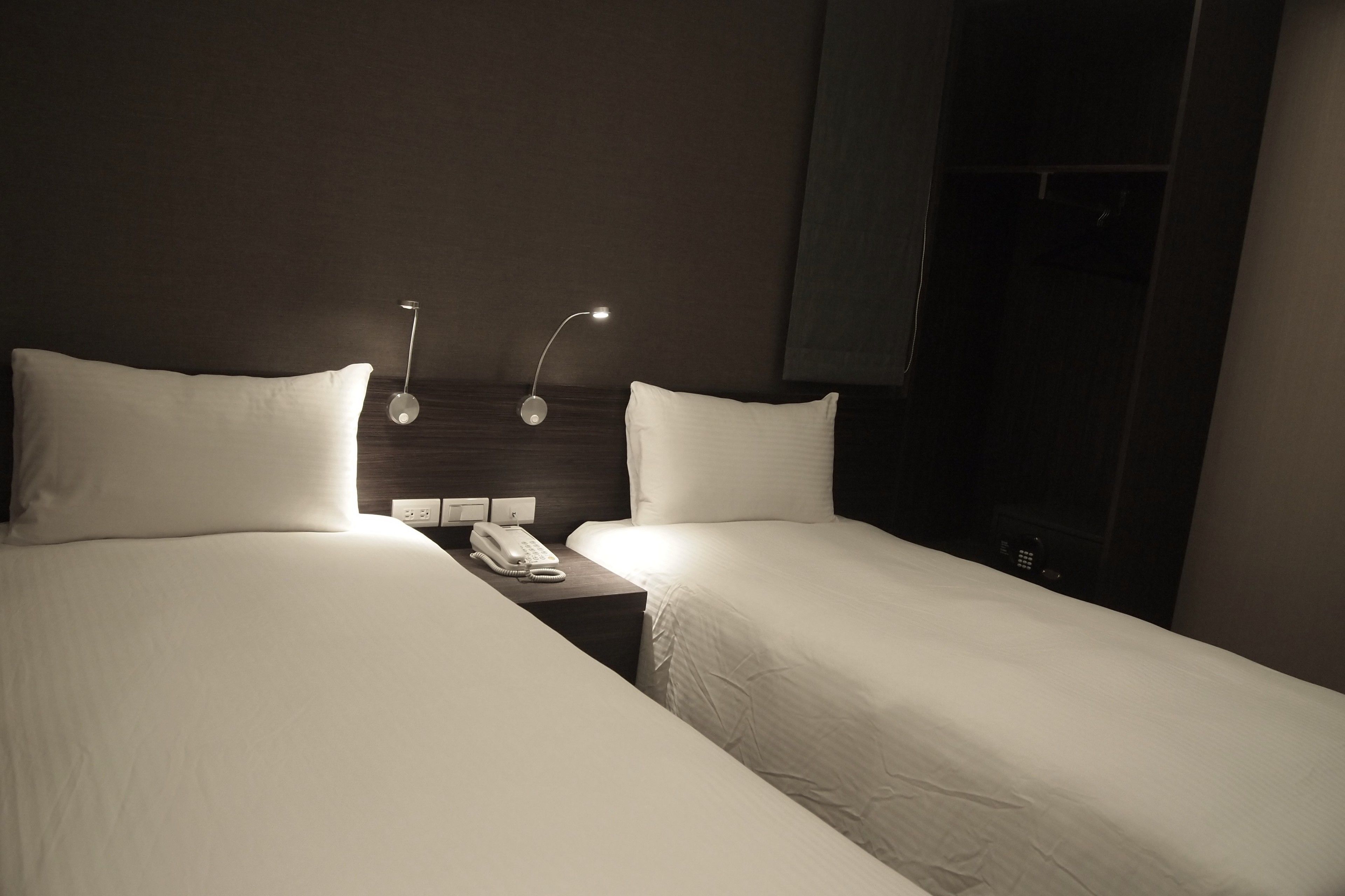 economy twin room | in-room safe, individually decorated, desk, blackout curtains