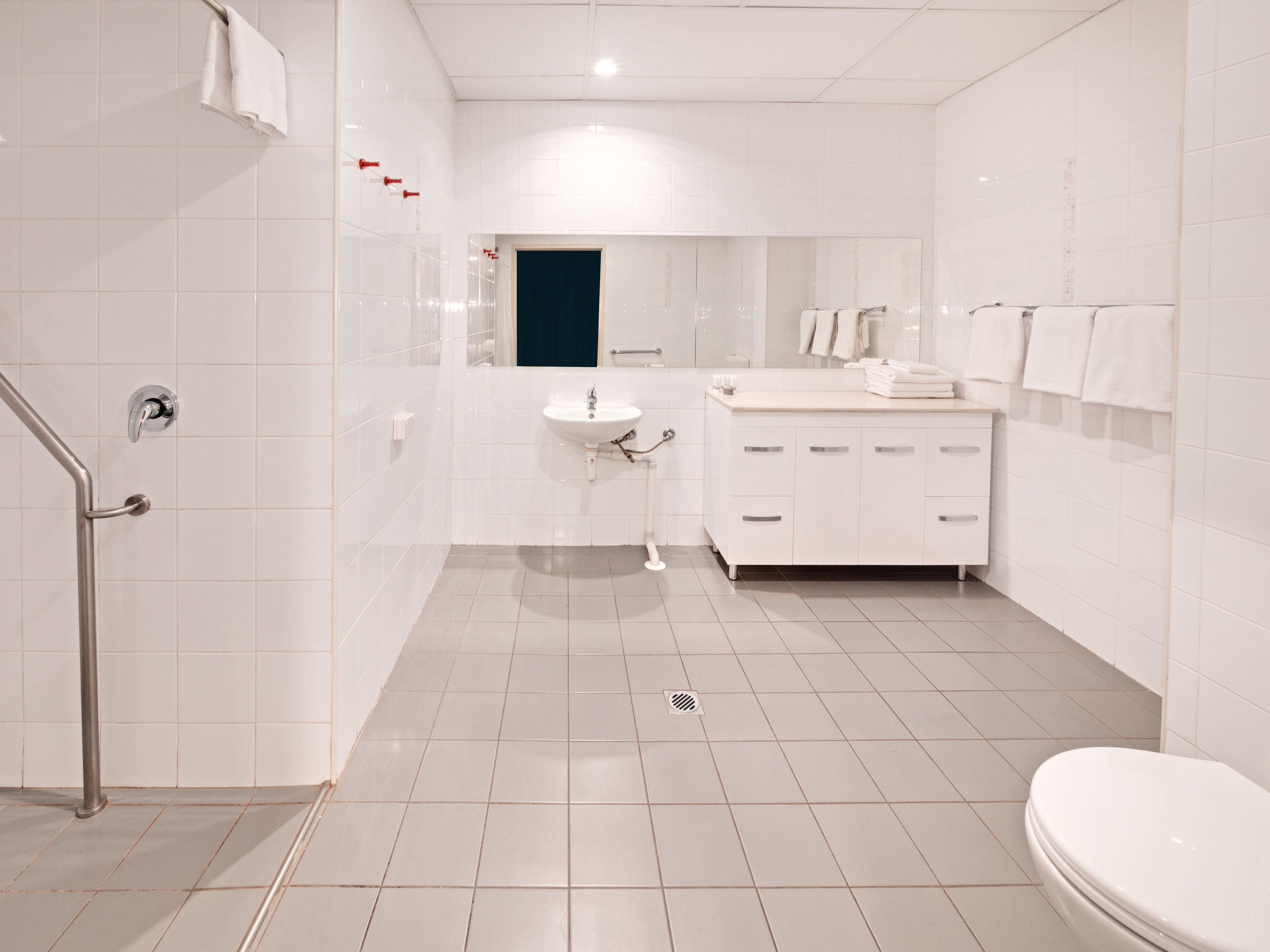 family room | bathroom | shower, rainfall showerhead, free toiletries, hair dryer