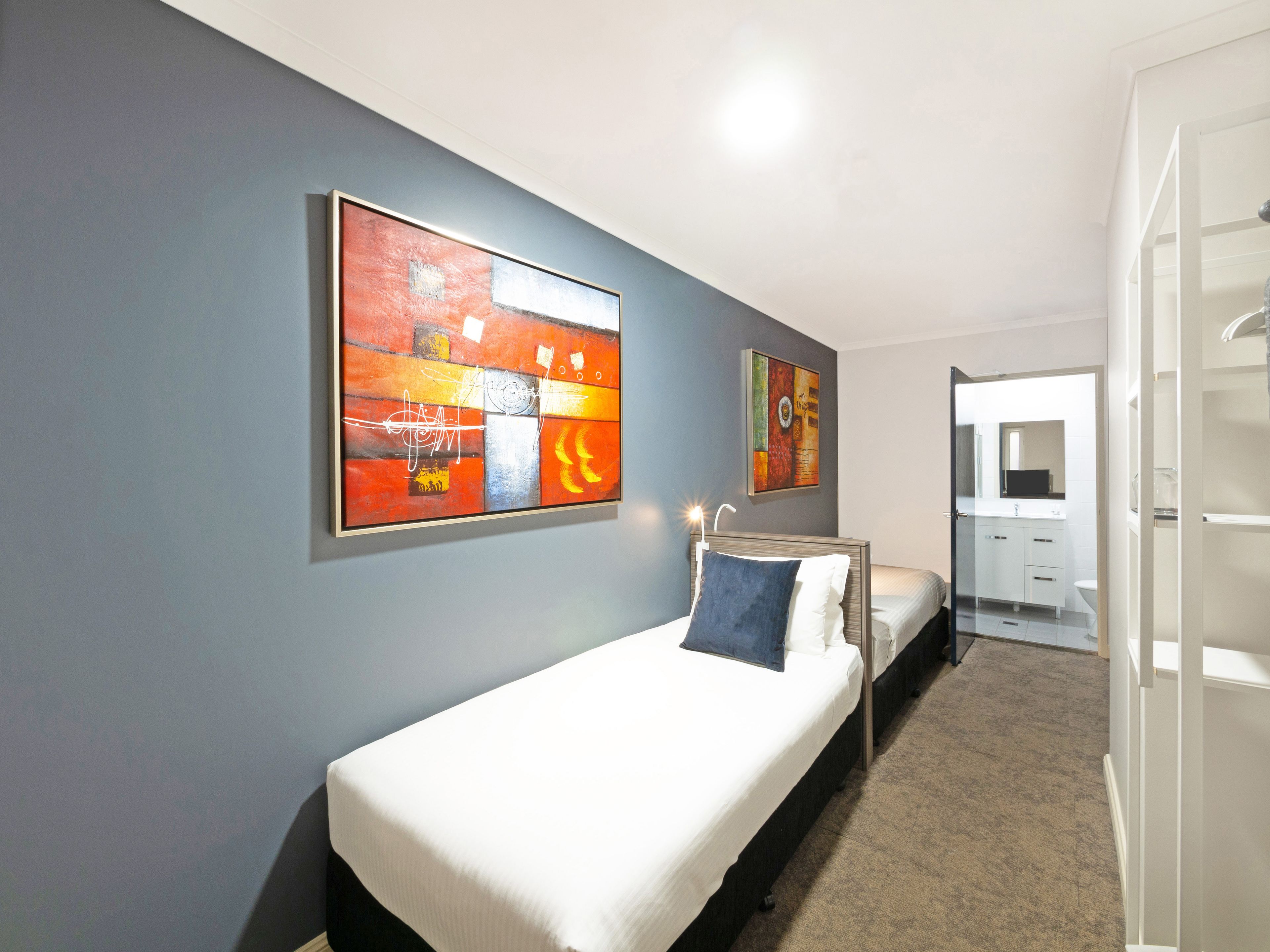 desk, laptop workspace, iron/ironing board, free cots/infant beds