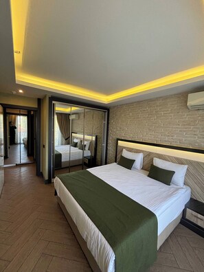 Premium bedding, memory-foam beds, minibar, in-room safe