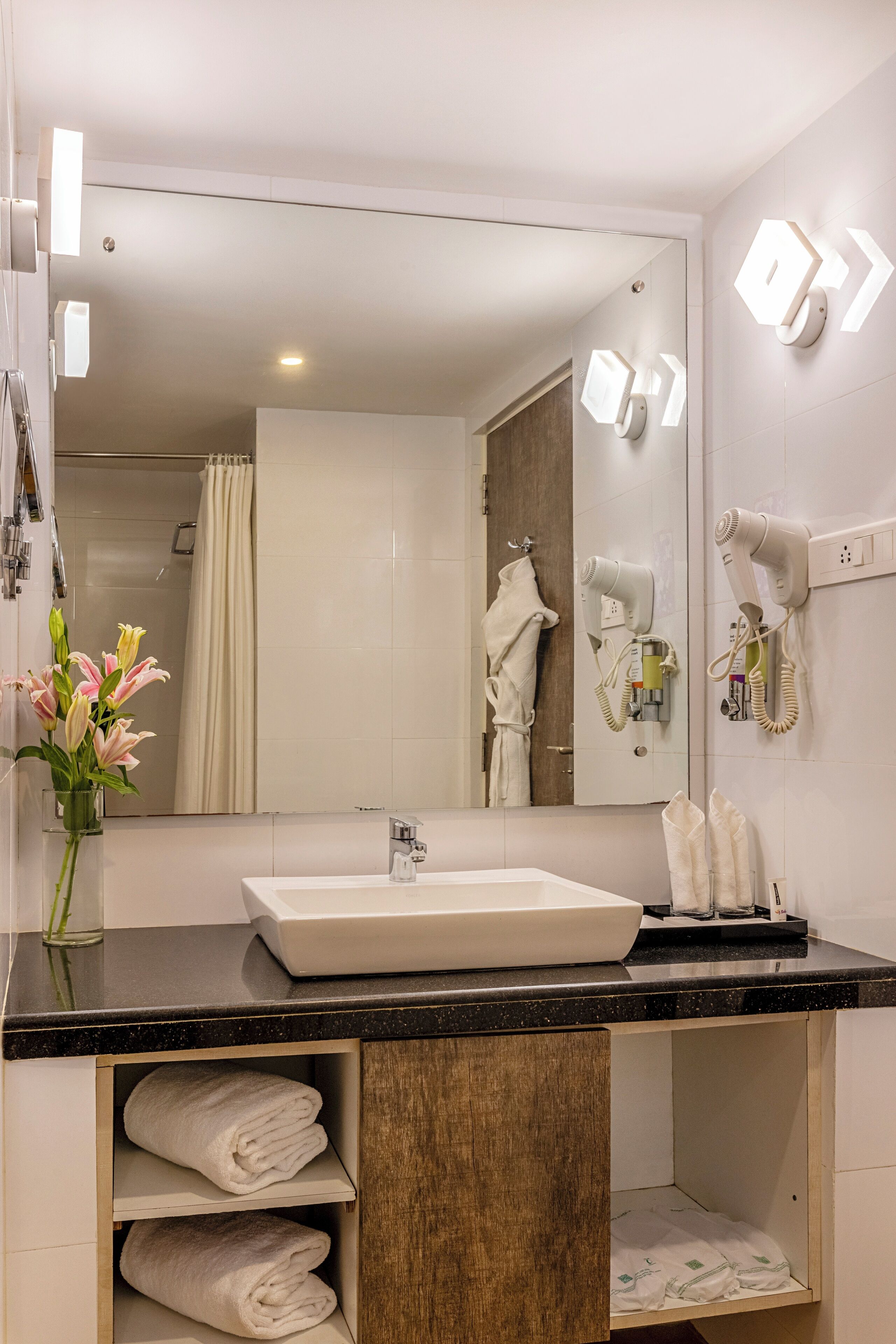 indulge room with balcony | bathroom | shower, free toiletries, towels