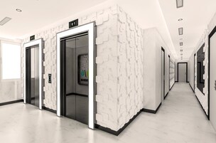 A modern elevator with a geometric wall design, a hallway with a patterned wall, and a marble floor.