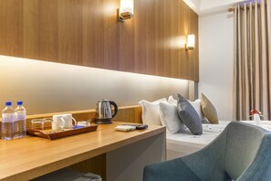 Ropa de cama de alta calidad y minibar 