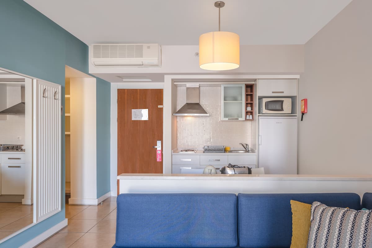 full-sized fridge, microwave, stovetop, coffee/tea maker