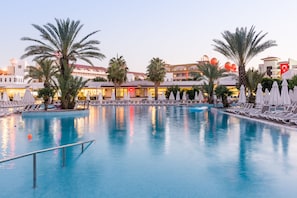 Seasonal outdoor pool, pool umbrellas, pool loungers