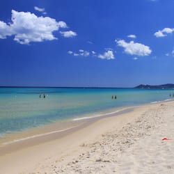 On the beach, sun-loungers, beach bar