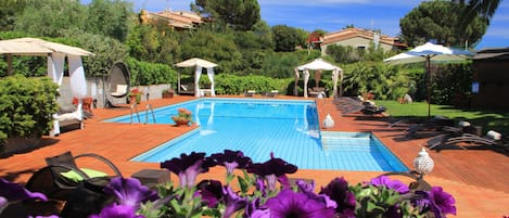 Seasonal outdoor pool, pool umbrellas, sun loungers