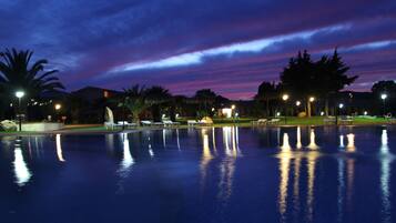 Seasonal outdoor pool, pool umbrellas, pool loungers