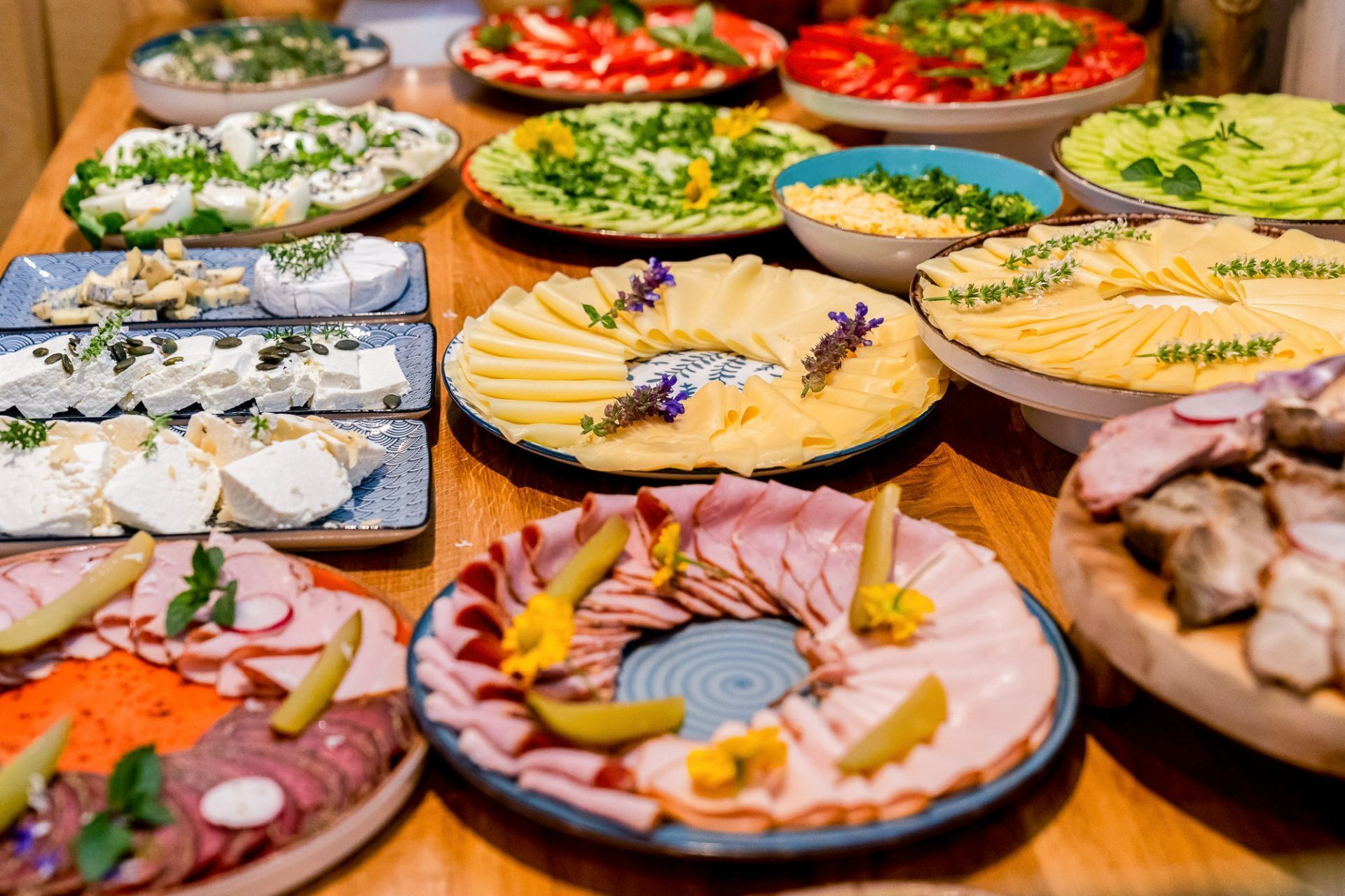 A variety of food platters on a table.