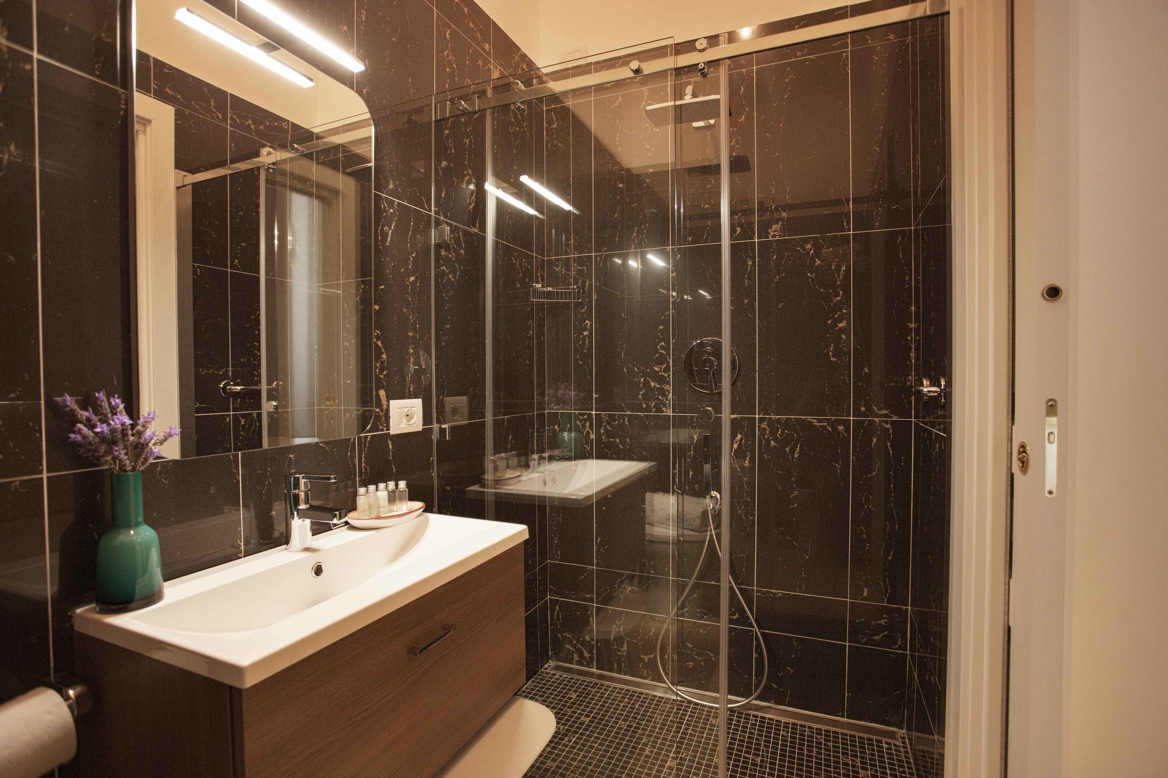superior double room | bathroom | shower, designer toiletries, hair dryer, slippers