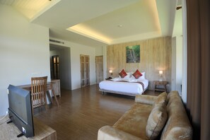 Deluxe Double Room | Living area | 32-inch flat-screen TV with digital channels, TV - Nansripanna Resort (Nan)
