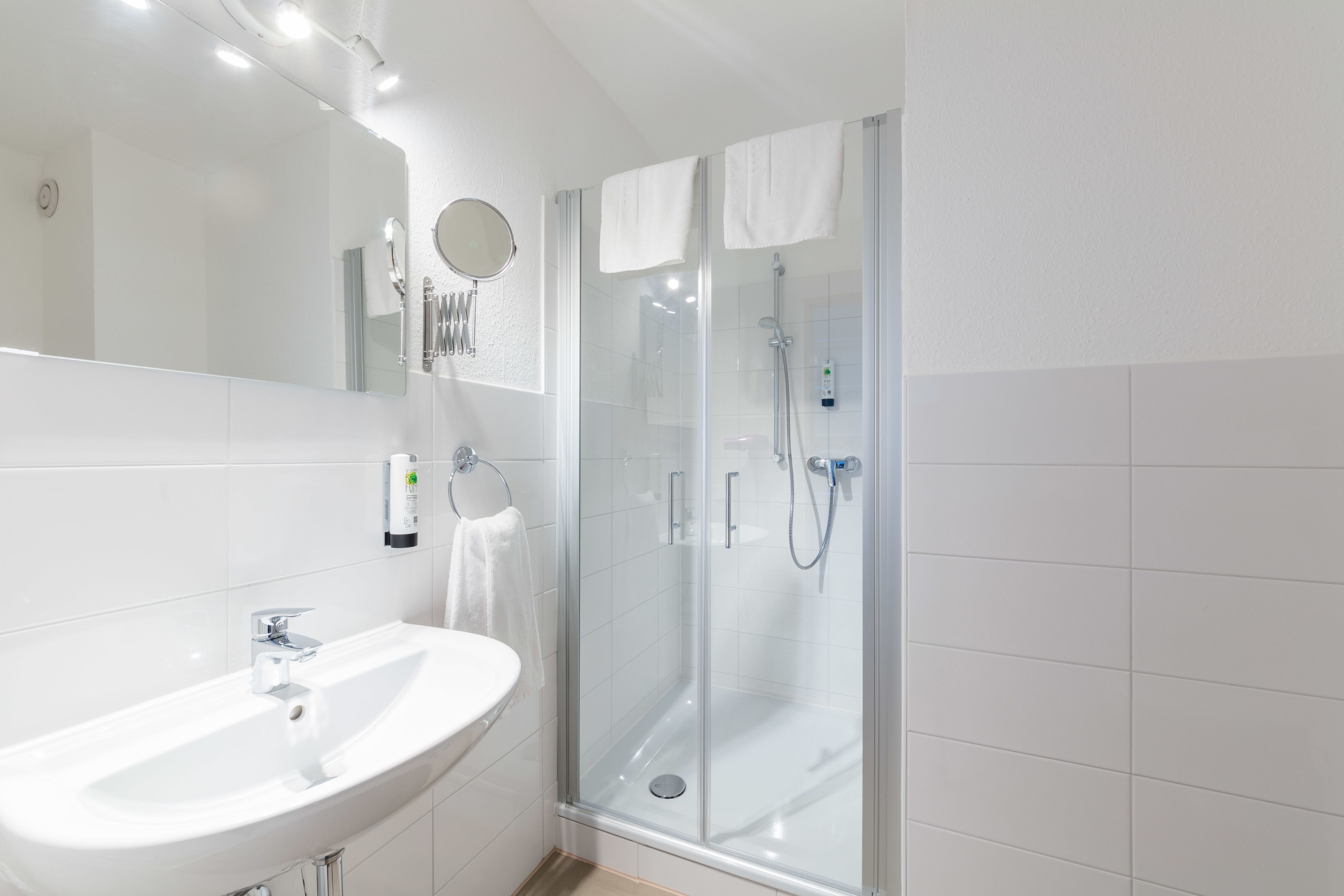 shower, free toiletries, hair dryer, towels