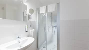 Shower, free toiletries, hair dryer, towels