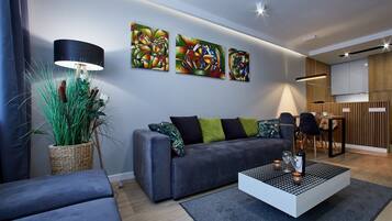 Comfort Apartment, 1 Bedroom, Balcony | Living room | Flat-screen TV