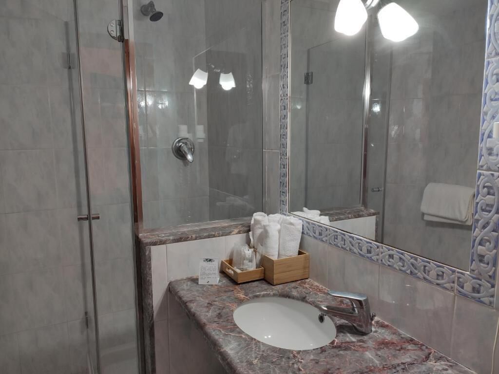 executive double room | bathroom | shower, free toiletries, hair dryer, bidet